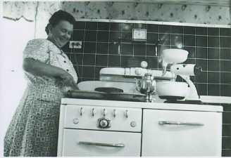 It's noon and Hilma's baking a two-layer cake or maybe her astonishing Nisu. See the coffee pot?